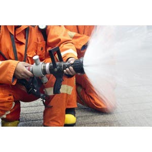 firefighter-with-hose_shutterstock_13404
