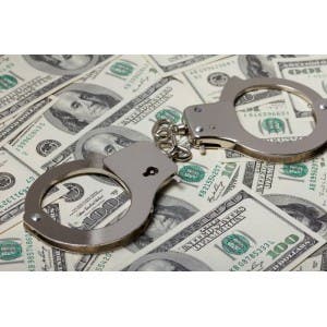 money_handcuffs_shutterstock_186211292.j