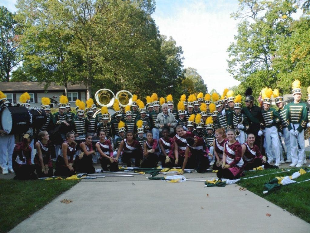 WSHS marching band surprises Lake Ridge supporter with a visit ...