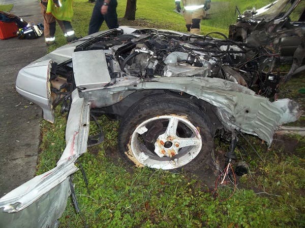 Photos Man Survives 'Horrific' Crash That Cut Car in 2