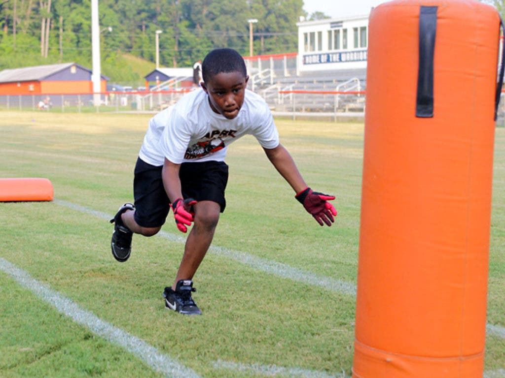 Acworth Kids Practice Football in Heat Acworth, GA Patch