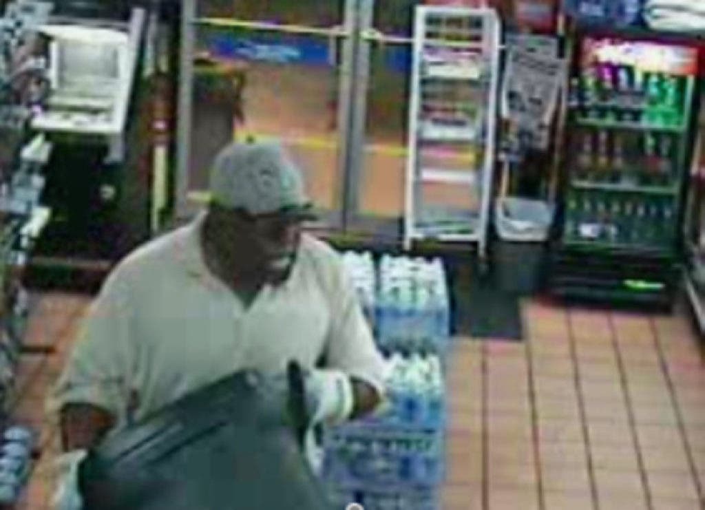 Detectives Looking for Cigarette Bandit