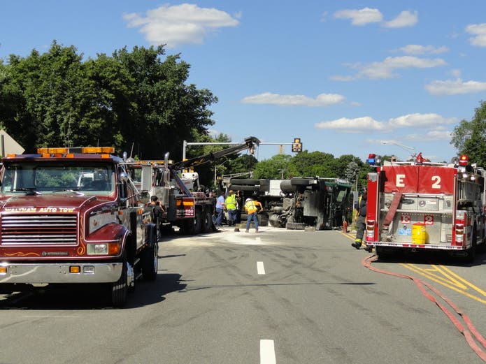 PHOTOS/VIDEO: Garbage Truck Rolls Over on Pleasant Street | Arlington