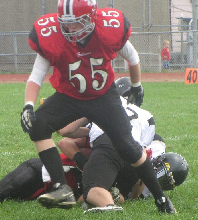 Divine child football overpowers general amherst dearborn mi patch