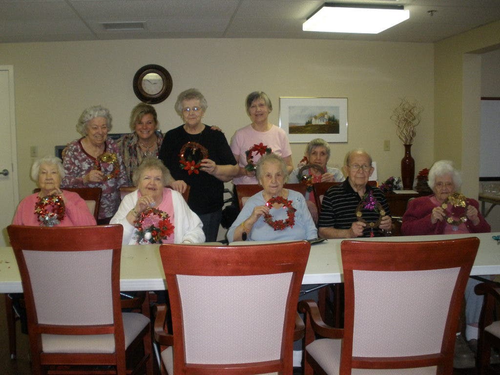 Virginia Connolly Residents Enjoy Making Wreaths with the Staff from