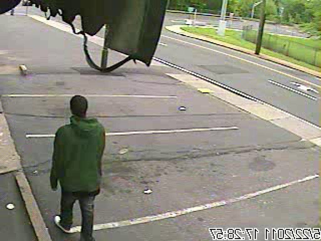 Updated: Police Release Photos of 'Possible Suspect' in Convenience ...