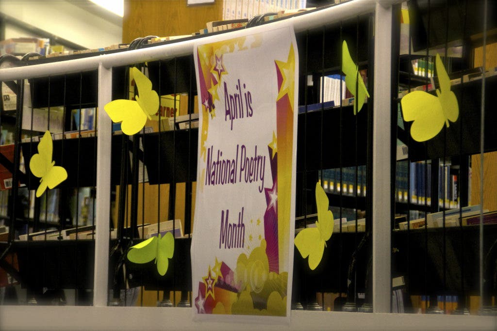 View Finder: Volunteers Plant Flowers at Commack Public Library ...