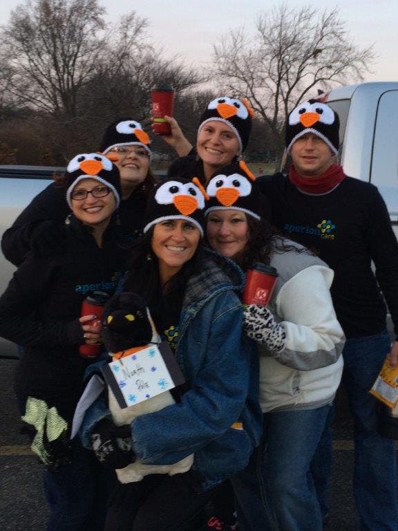 Aperion Care Wilmington's Staff Padded as Penguins in Town's Penguins