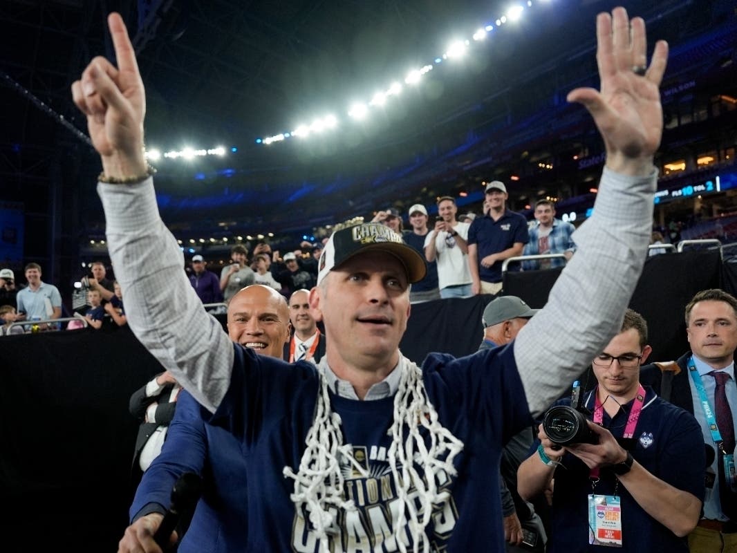 UConn head coach Dan Hurley greets fans after the Huskies' win against Purdue in the NCAA title game on April 8. UConn is laying low on a report that the NBS's Los Angeles Lakers are courting him. 