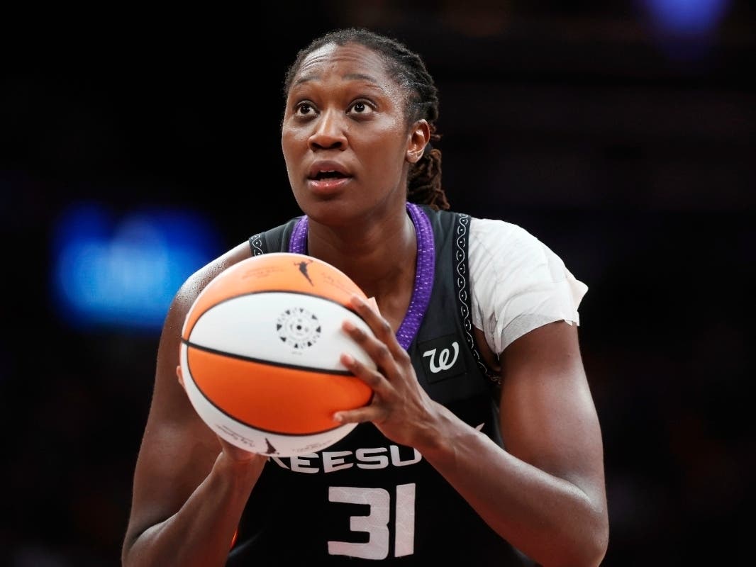 The Connecticut Sun's Tina Charles plays against the Indiana Fever during the second half of a WNBA basketball game on July 15 in Boston. The former Sun and UConn legend retired Tuesday.