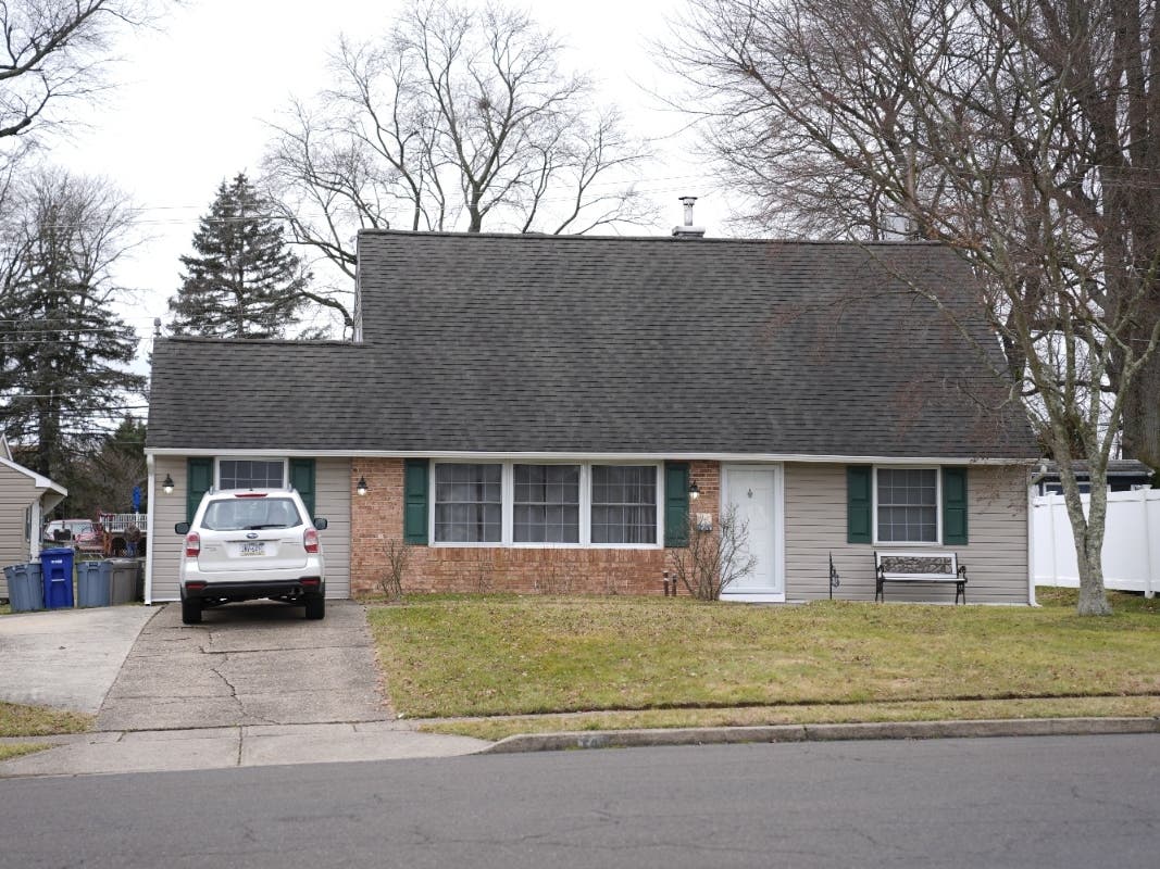 Carrie McCarthy grew up in the Levittown neighborhood where Justin Mohn is accused of killing and beheading is father on Tuesday night.