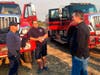 California Gov. Gavin Newsom talks with firefighters Darrin Mayo, left, and Aaron Bjorgum, from Lincoln, Calif., helping fight the Kincade Fire outside Santa Rosa, Calif., Monday, Oct. 28, 2019.