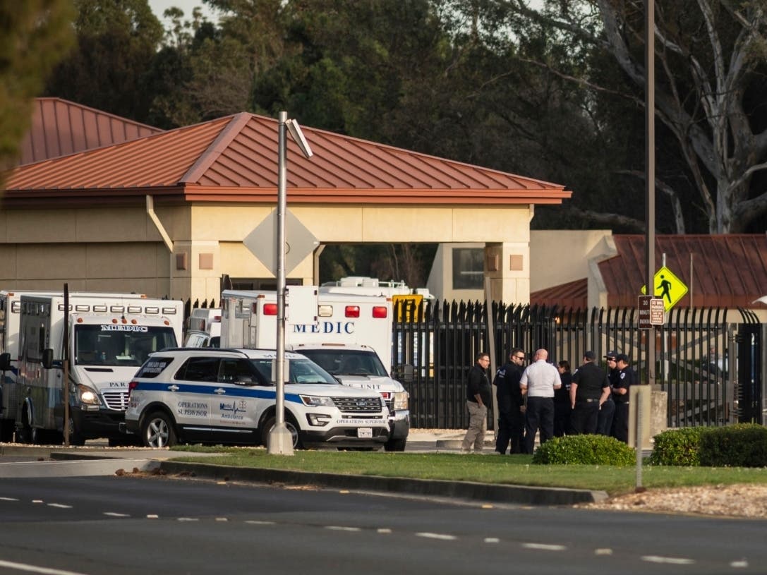 Emergency medical personnel are pictured outside Travis AFB as they await arrival of Diamond Princess cruise ship coronavirus evacuees from Japan.
