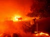 Bill Nichols, 84, works to save his home as the LNU Lightning Complex fires tear through Vacaville, Calif., on Wednesday, Aug. 19, 2020. Nichols has lived in the home for 77 years. 