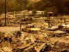 Scorched homes and vehicles fill Spanish Flat Mobile Villa following the LNU Lightning Complex fires in unincorporated Napa County, Calif., on Thursday, Aug. 20, 2020. 