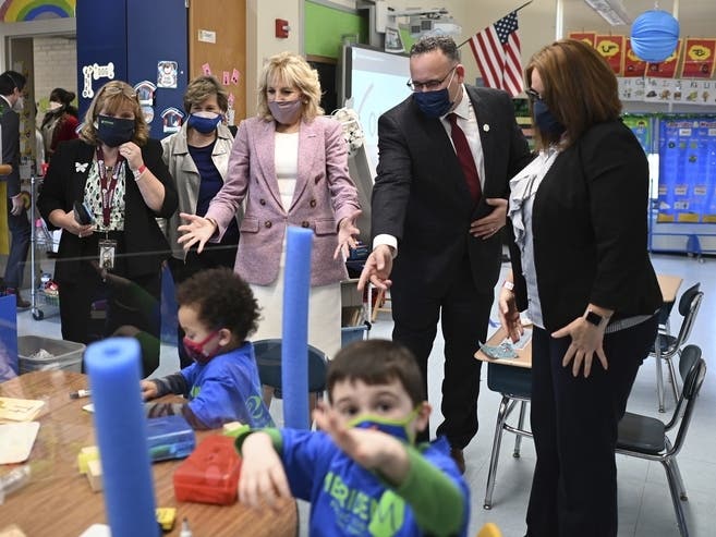First lady Jill Biden and U.S. Education Secretary Miguel Cardona tour Benjamin Franklin Elementary School in Meriden on Wednesday.