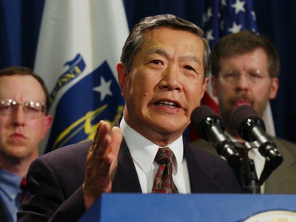 Forensic scientist Dr. Henry Lee faces reporters regarding the death penalty system at the Statehouse in Boston on May 3, 2004.