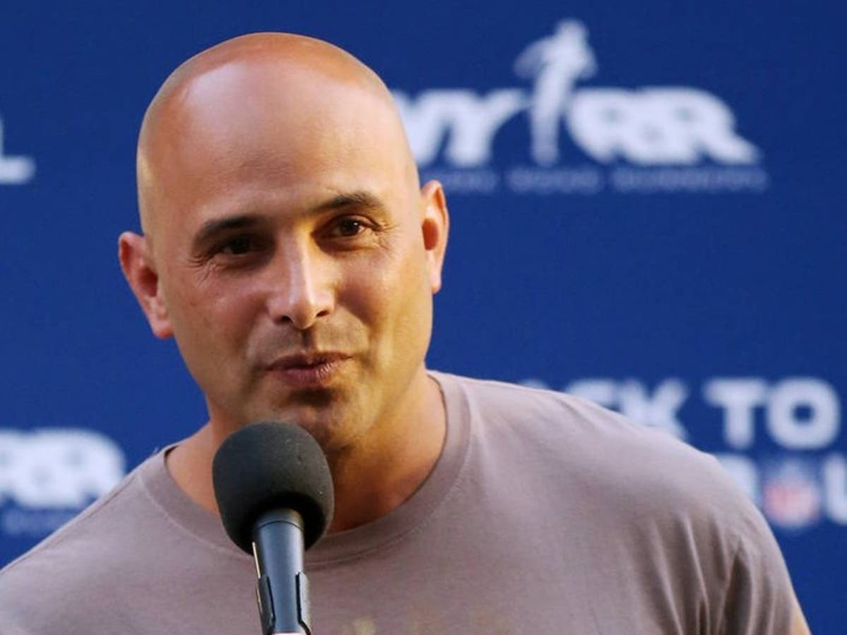 Craig Carton, at the Aug. 30, 2012 NFL Back to Football Run, is to be sentenced April 5 in a $4 million Ponzi scam.