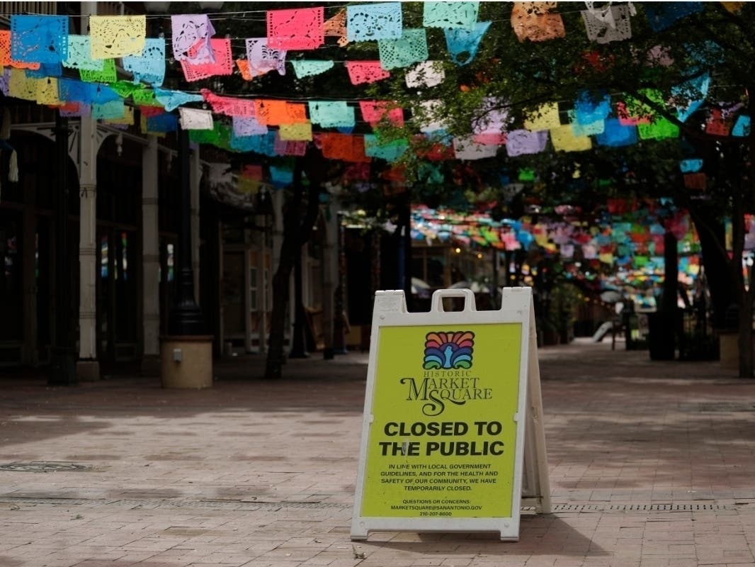 Papel picado decorates a closed Market Square in downtown San Antonio, Thursday, April 16, 2020.