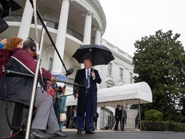President Donald Trump speaks about the coronavirus as he walks to Marine One to depart the White House, Saturday in Washington. Trump is en route to Norfolk, Virginia, for the sailing of the USNS Comfort, which is headed to New York.