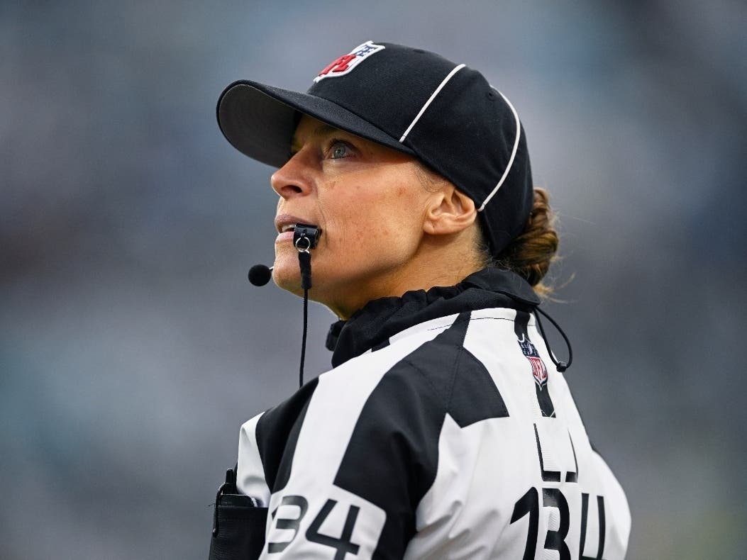 Line judge Robin DeLorenzo looks on during the second half of an NFL football game between the Jacksonville Jaguars and the Tennessee Titans, Dec. 29, 2024, in Jacksonville, Fla.