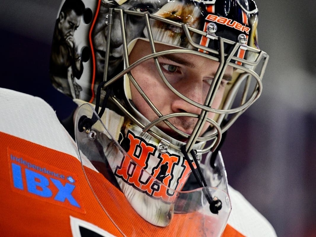 Flyers goaltender Carter Hart has surrendered to police after being charged with sexual assault. 