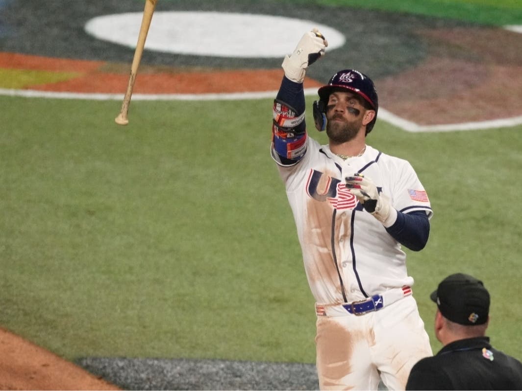 Philadelphia Phillies star Bryce Harper had two of Team USA's three hits, including a game-tying home run in the bottom of the eighth, during the World Baseball Classic championship game against Venezuela Tuesday night. 