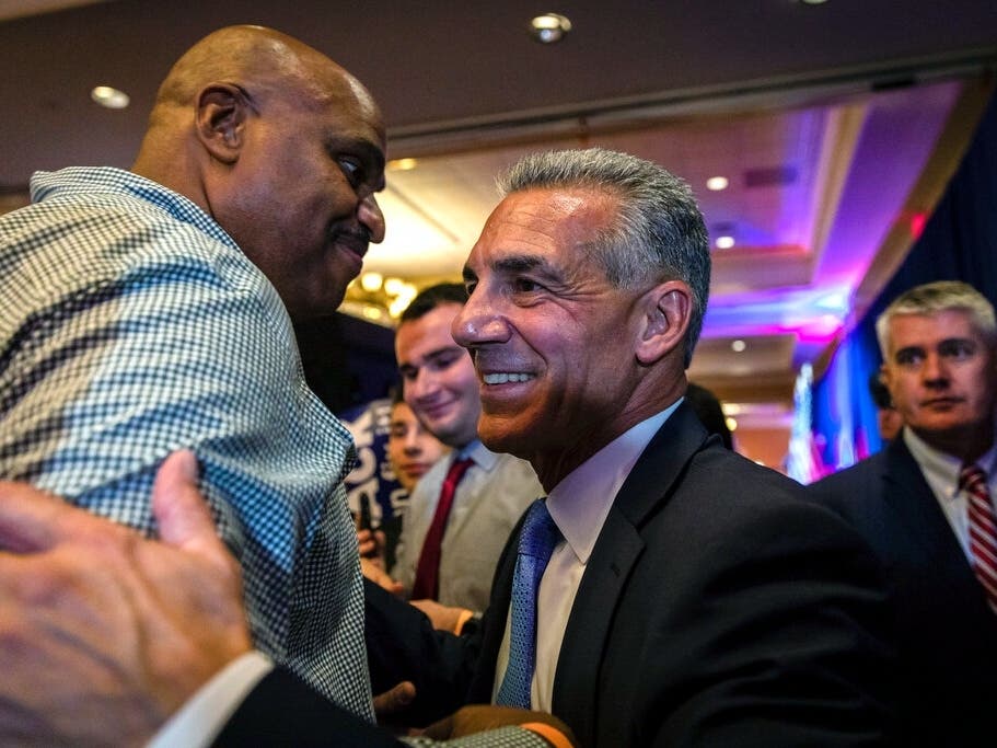 Ciattarelli greets a supporter at his election night party in Bridgewater Wednesday.