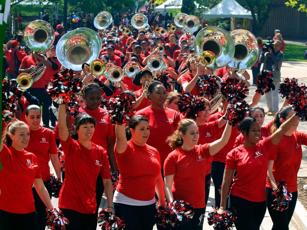 The Rutgers marching band marches through campus on Rutgers Day 2012.