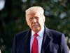 President Donald Trump speaks to the media before boarding Marine One on the South Lawn of the White House, Tuesday, Jan. 12, 2021 in Washington. The President is traveling to Texas.