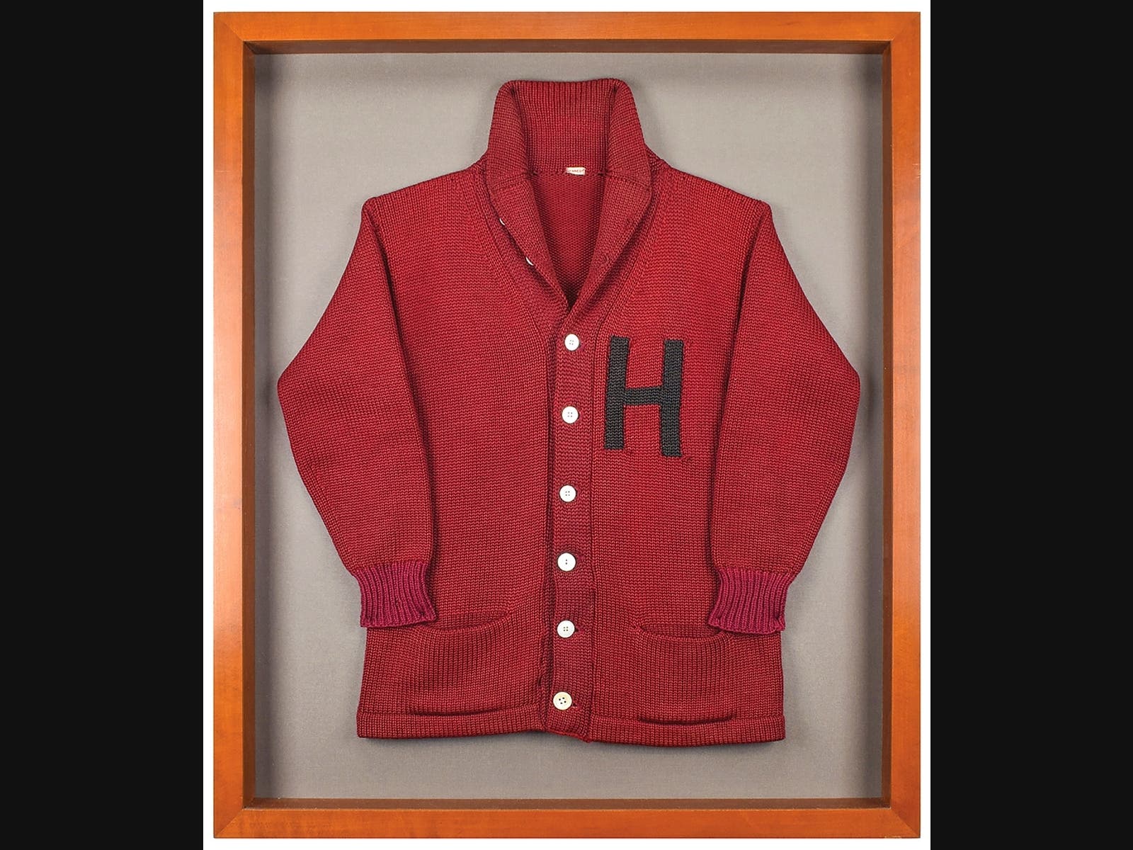 This undated photo released by RR Auction shows a Harvard University letter sweater that once belonged to former President John F. Kennedy, up for auction between Feb. 11-18, 2021, by the Boston-based auction firm.