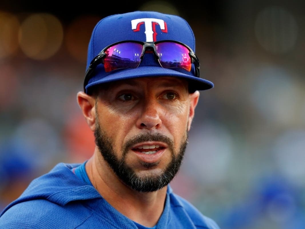 In this June 26, 2019, file photo, Texas Rangers major league player development field coordinator Jayce Tingler watches in the third inning of a baseball game against the Detroit Tigers in Detroit. 