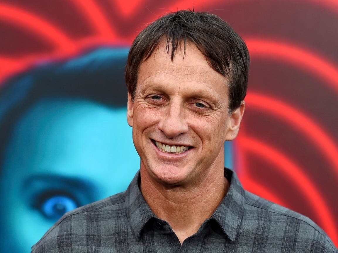 In this July 25, 2018 file photo, skateboarding legend Tony Hawk arrives at the world premiere of "The Spy Who Dumped Me" in Los Angeles. Hawk is among several inductees for the next class of the California Hall of Fame. 
