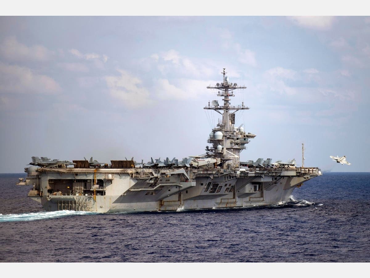 In this March 18, 2020, photo provided by the U.S. Navy, an F/A-18F Super Hornet launches from the flight deck of the aircraft carrier USS Theodore Roosevelt (CVN 71) in the western North Pacific Ocean.