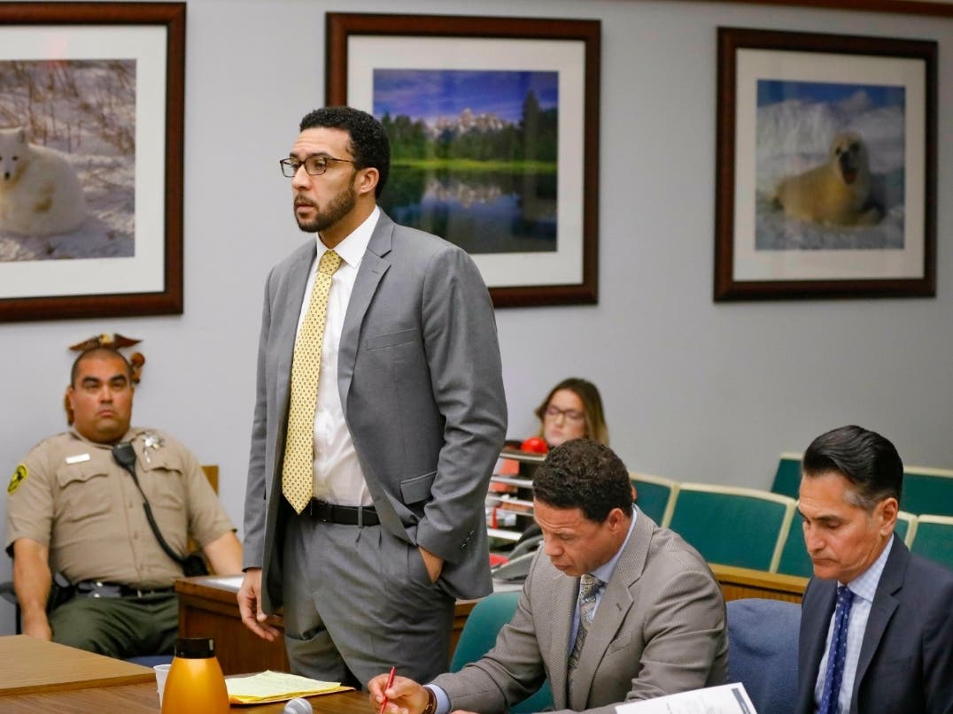 Ex-NFL player Kellen Winslow II, standing, answers a question from San Diego County Superior Court Vista Judge Blaine Bowman during a status hearing Friday, June 14, 2019 in Vista, Calif.​