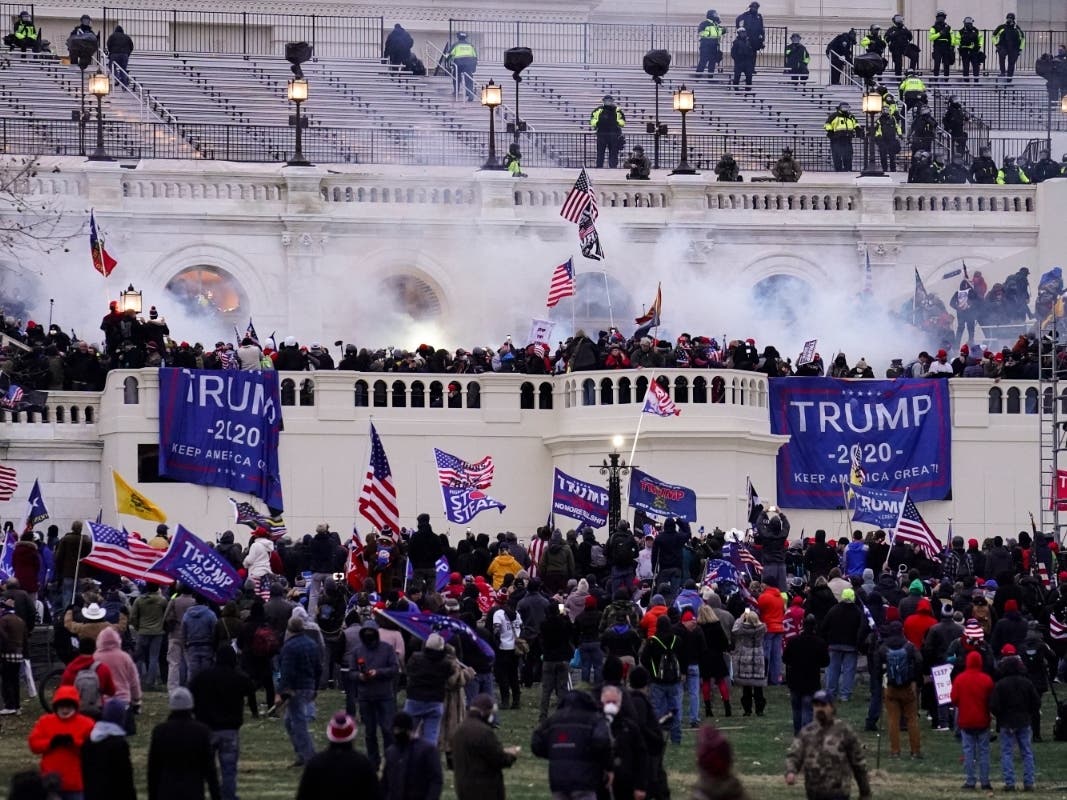 In this Wednesday, Jan. 6, 2021, file photo, violent rioters storm the Capitol, in Washington.