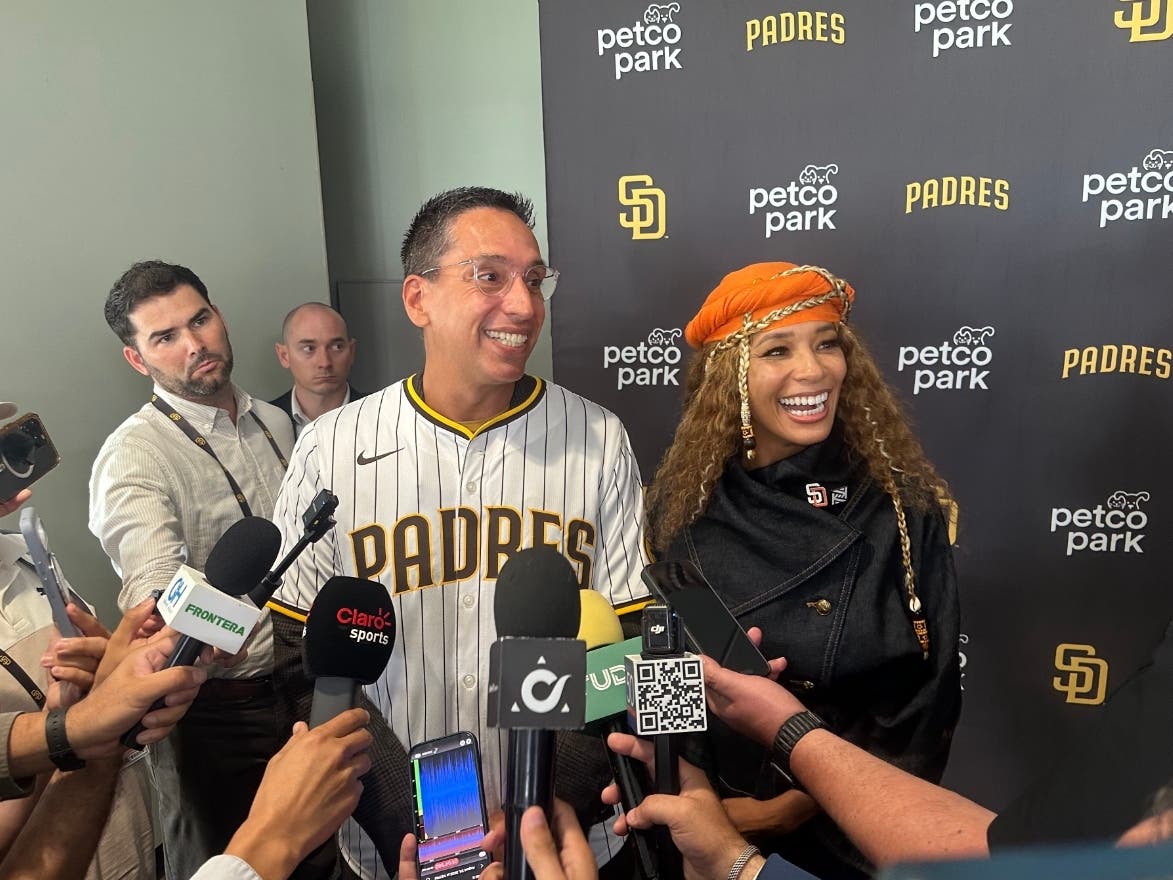 New San Diego Padres owners Kwanza Jones, right, and José E. Feliciano speak to the media at Petco Park in San Diego, Calif., Monday, Aug. 24, 2026.
