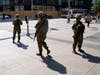 Minnesota National Guard soldiers stand watch along the famous Nicollet Mall Thursday, Aug. 27, 2020, in downtown Minneapolis. 