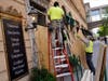 Workers board up windows along the famous Nicollet Mall Thursday, Aug. 26, 2020, in downtown Minneapolis.
