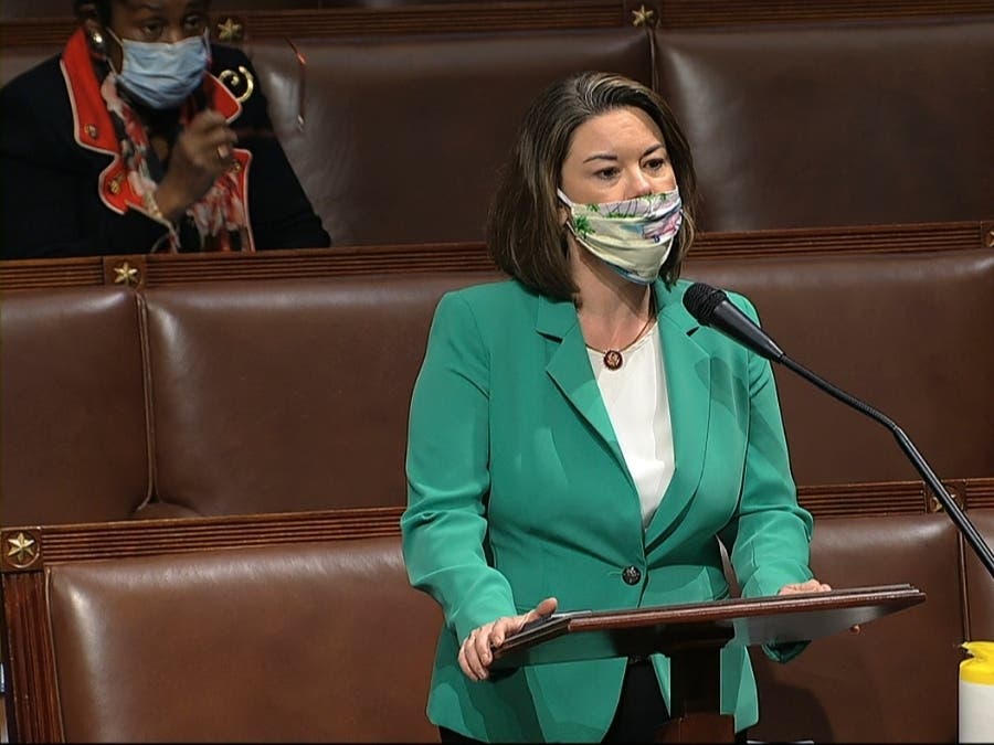In this image from video, Rep. Angie Craig, D-Minn., speaks on the floor of the House of Representatives at the U.S. Capitol in Washington, Thursday, April 23, 2020.