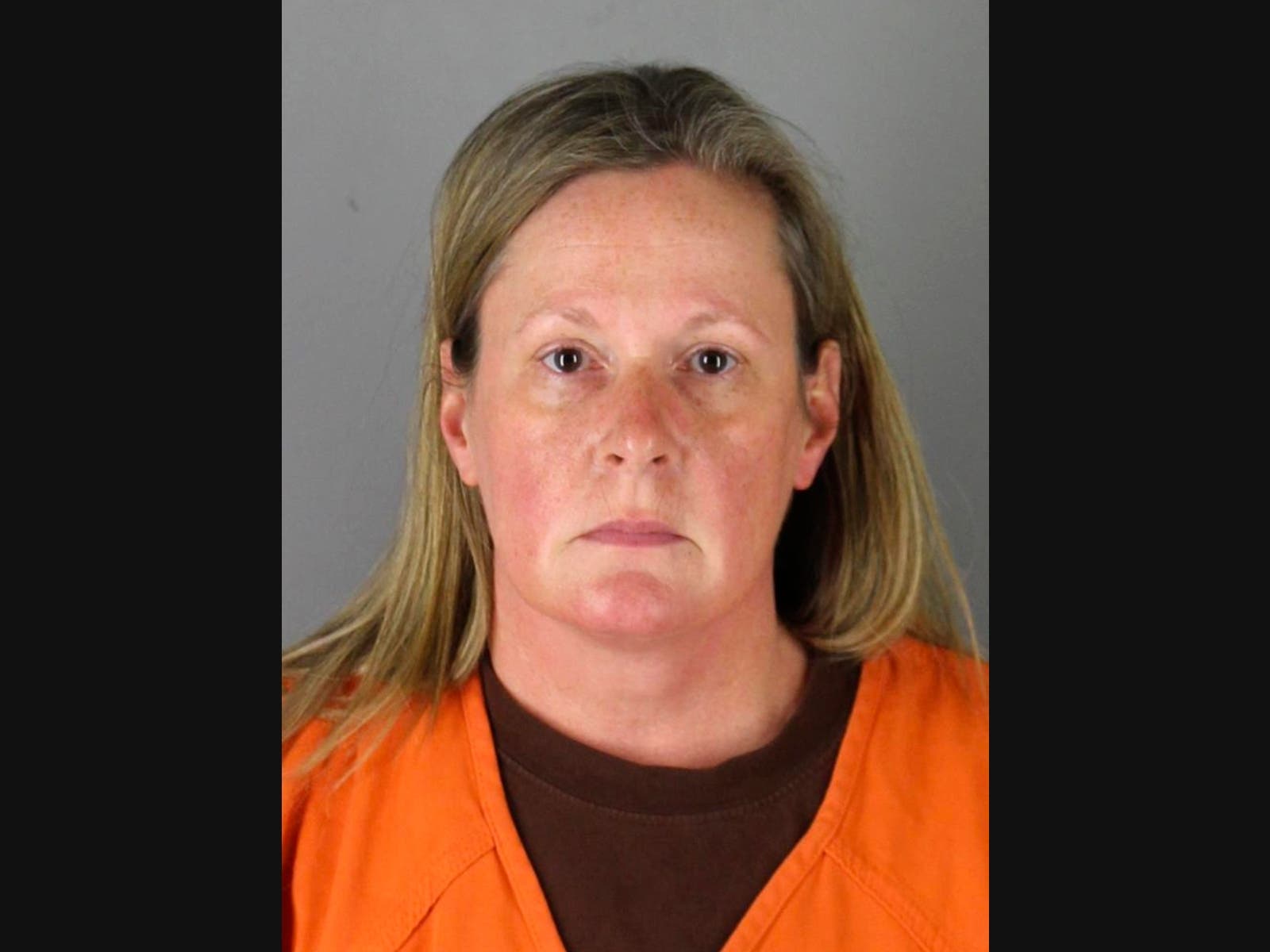 This booking photo released by the Hennepin County, Minn., Sheriff shows Kim Potter, a former Brooklyn Center, Minn., police officer who is charged Wednesday, April 14, 2021, with second-degree manslaughter for killing a 20-year-old Black motorist.