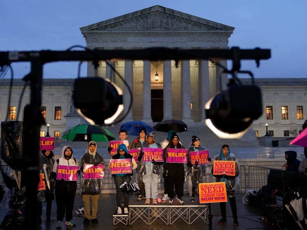 Student debt relief advocates gather outside the U.S. Supreme Court on Capitol Hill in Washington, Monday, Feb. 27, 2023.