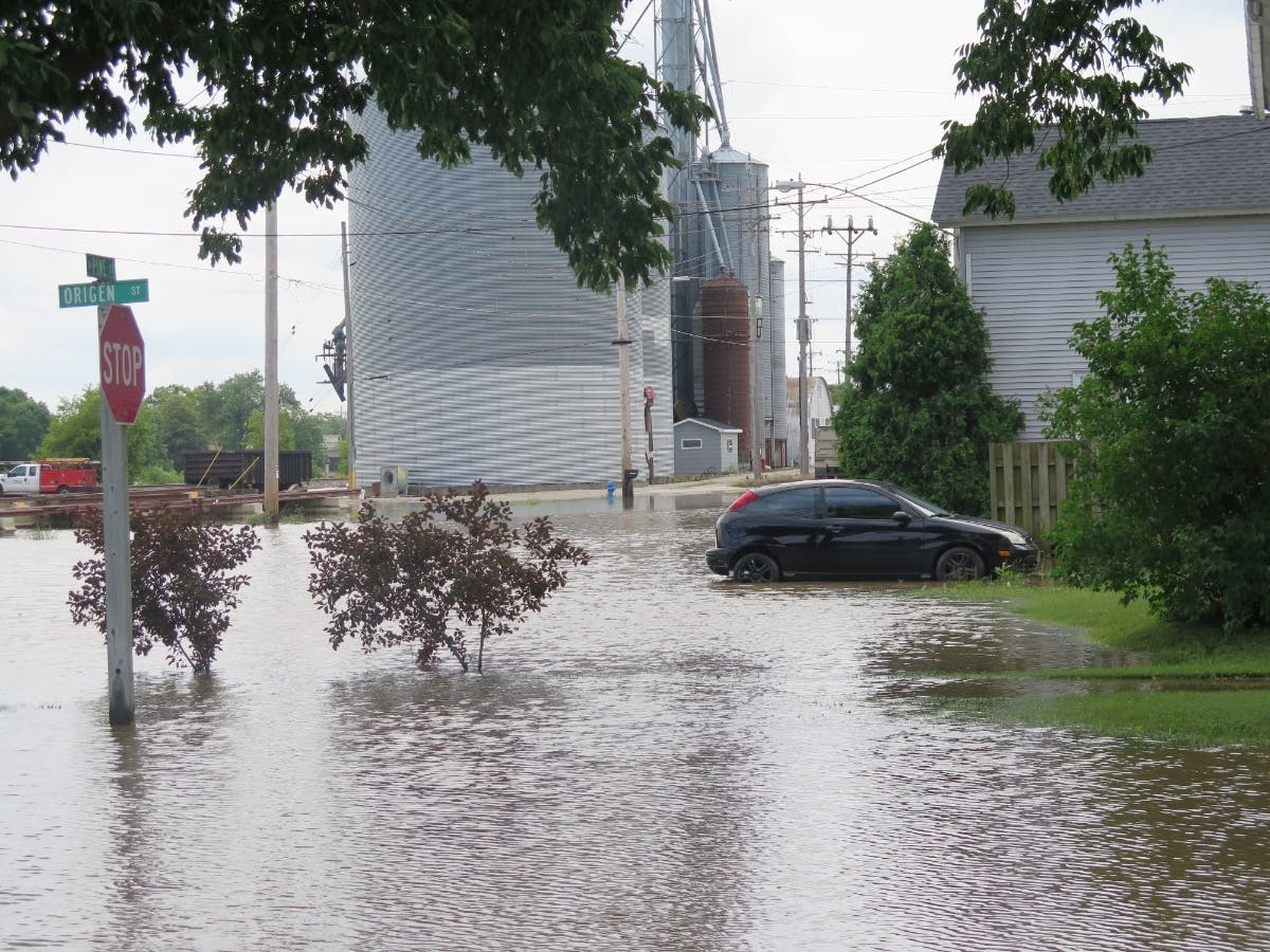 Parts of the streets are still submerged by Wednesday's flooding in Burlington, Wis., Thursday, July 13, 2017.