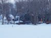Emergency personnel respond to the scene after a BNSF train derailed in Raymond, Minn., Thursday, March 30, 2023. 