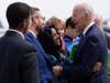 President Joe Biden hugs Rep. Ilhan Omar, D-Minn., as he is greeted at Minneapolis−Saint Paul International Airport, Monday, April 3, 2023, in Minneapolis.