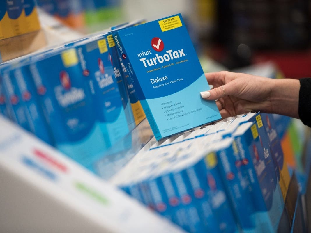 In this April 18, 2016 file photo a person looks at Intuit TurboTax software on display at a retailer in Foster City, Calif.