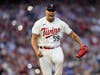 Minnesota Twins pitcher Jhoan Duran (59) celebrates after striking out Toronto Blue Jays' Daulton Varsho for the final out of Game 2 of an AL wild-card baseball playoff series Wednesday, Oct. 4, 2023, in Minneapolis.