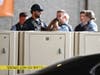 Members of law enforcement gather outside Hennepin County Medical Center in Minneapolis, on Thursday, May 30, 2024, following a fatal shooting.
