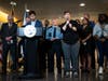 Mayor Jacob Frey, at podium, speaks at a news conference following a fatal shooting, in Minneapolis, Thursday, May, 30, 2024. Minneapolis police Officer Jamal Mitchell was among those killed.