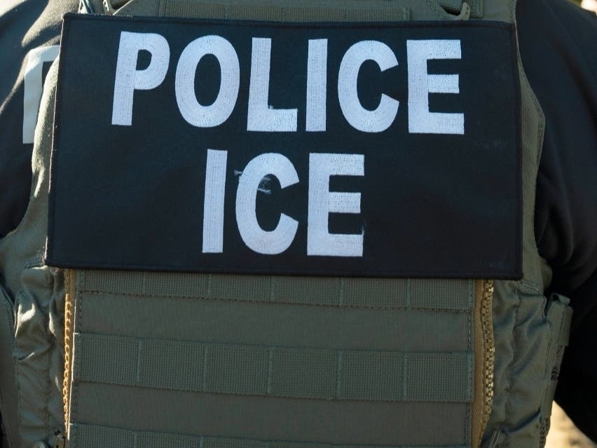 FILE - A U.S. Immigration and Customs Enforcement officer listens during a briefing, Monday, Jan. 27, 2025, in Silver Spring, Md.